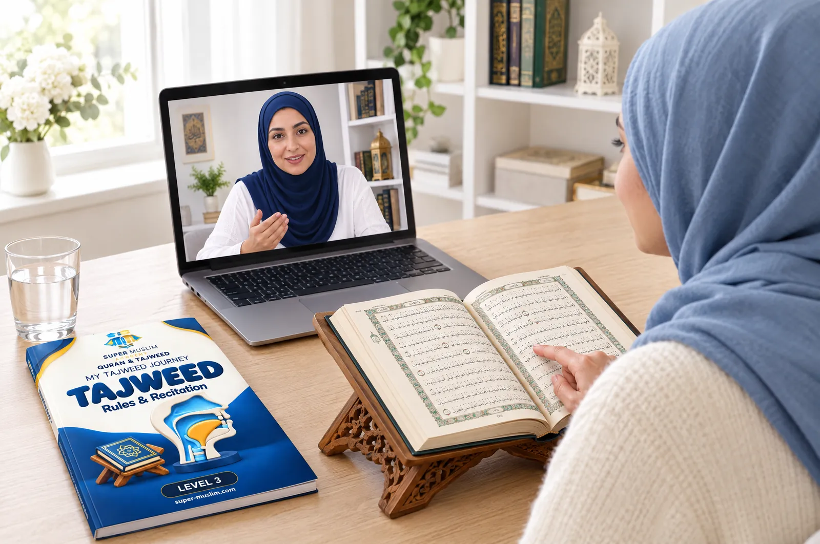 Sister reciting from the Mushaf on a wooden stand while her female Egyptian online Quran teacher explains on the laptop, with the Super Muslim Tajweed Level 3 book on the desk
